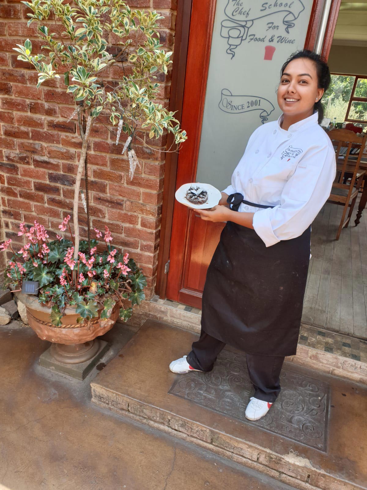 thechefschool chef holding dish